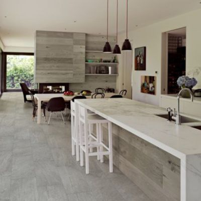 tile floors in a large open concept kitchen and dining room